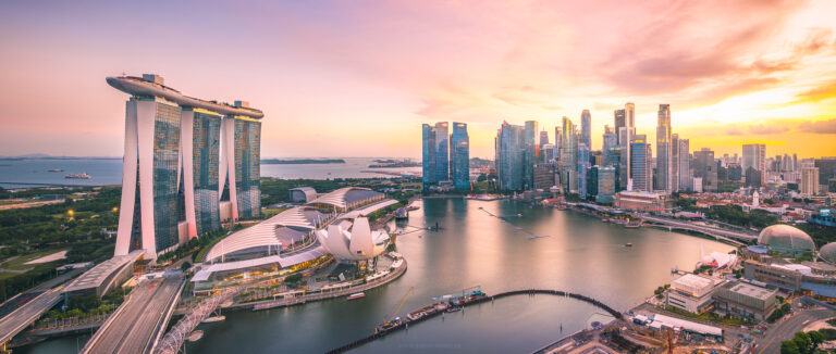 Sweeping views over the Singapore Marina from the 32nd floor of the Ritz Carlton in the warm golden light of sunset